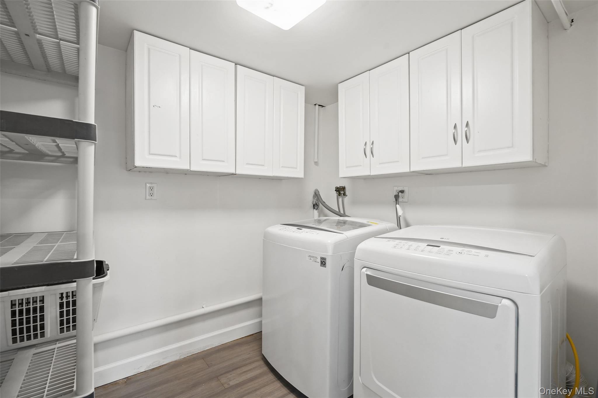 59 Hoags Cross Road Ossining, NY 10562 - Photo 20 of 25 a utility room with dryer and washer