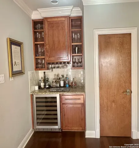 a kitchen with stainless steel appliances a refrigerator and stove