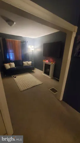 a bed room with a bed and a night stand