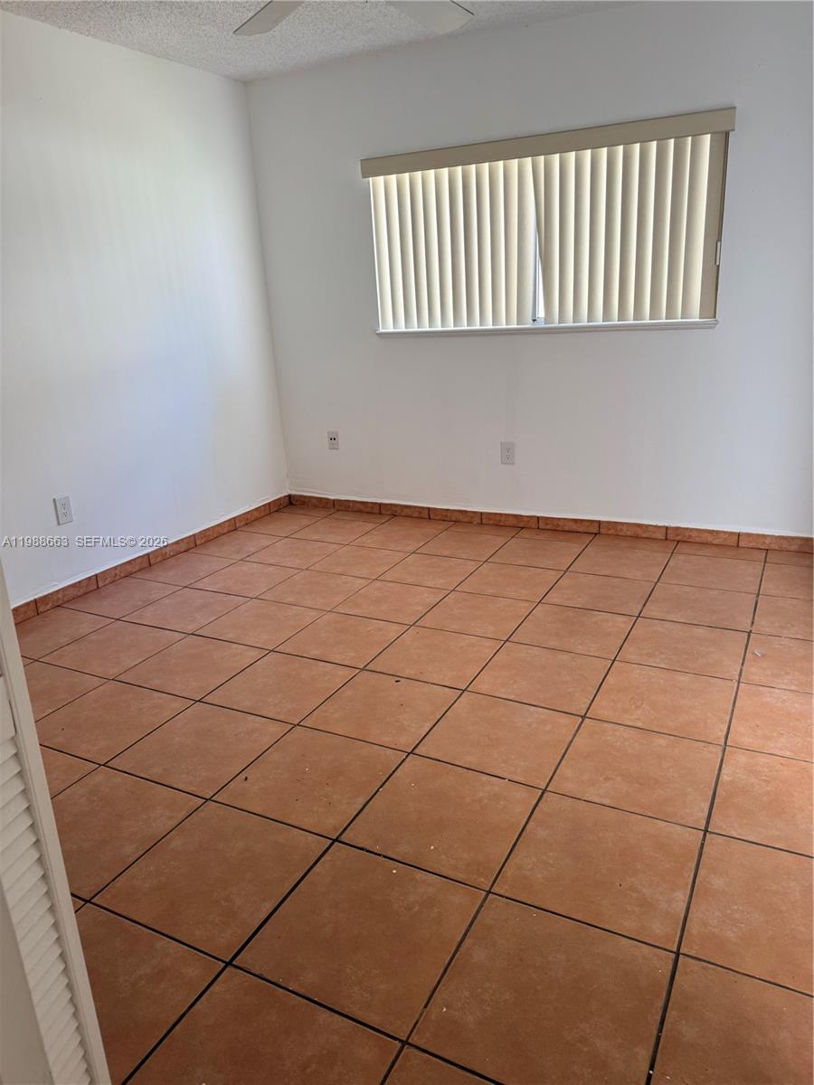 14343 Southwest 98th Terrace Miami, FL 33186 - Photo 9 of 16 a view of a room & utility area