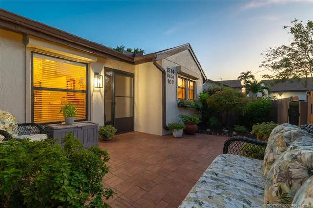 a house view with a backyard space