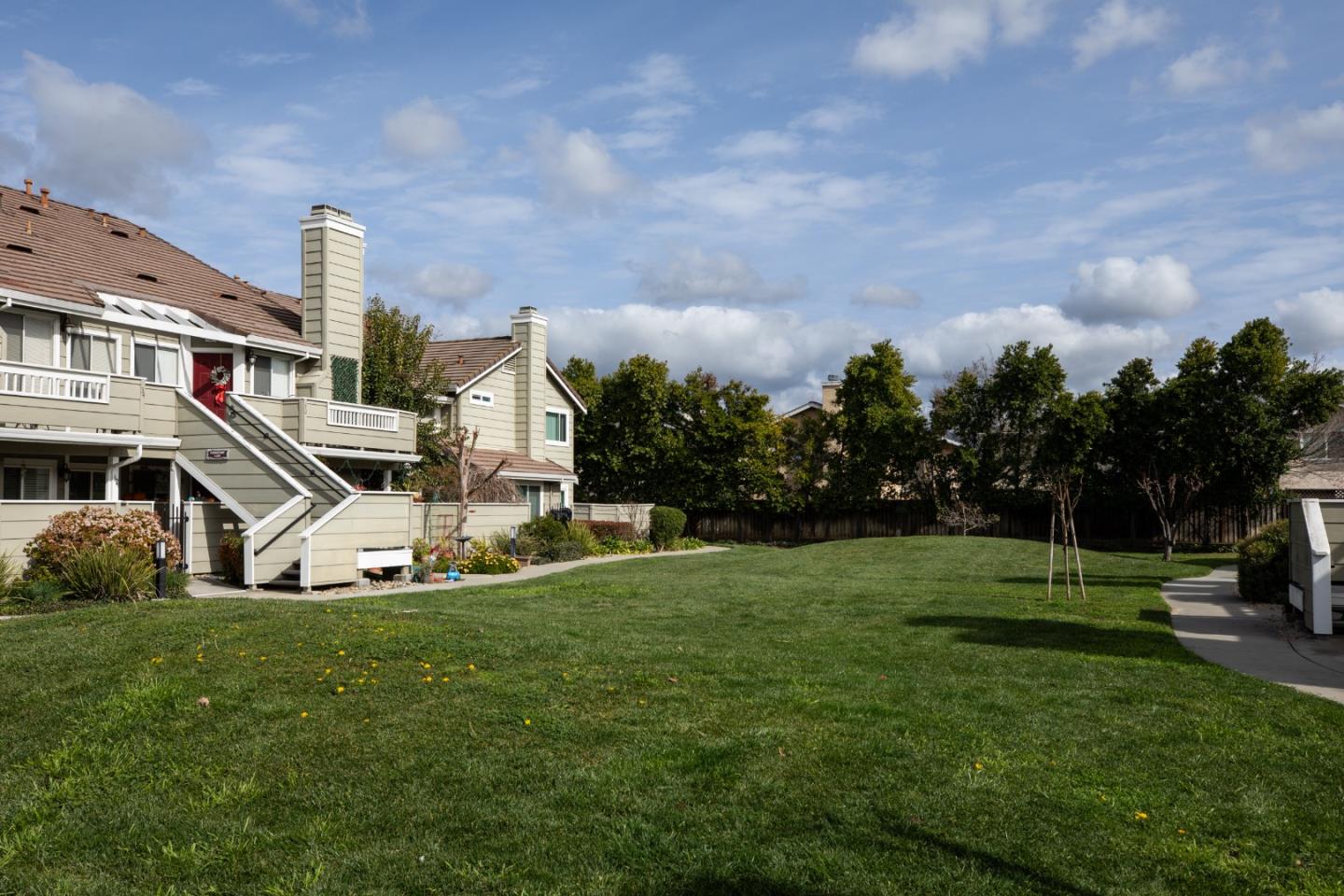 40 Cherryton Lane San Jose, CA 95136 - Photo 19 of 27 a view of a house with a big yard and large trees