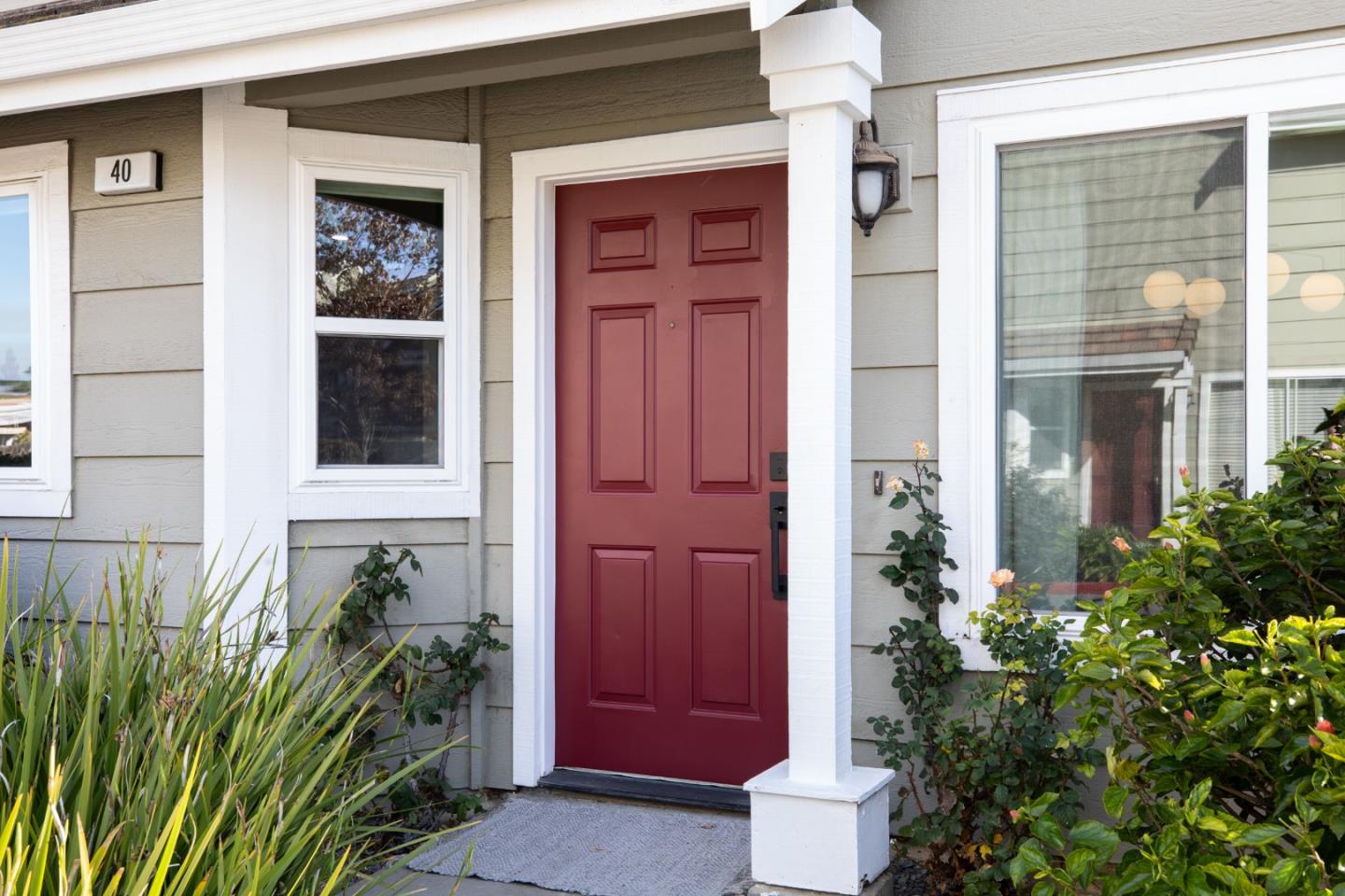 40 Cherryton Lane San Jose, CA 95136 - Photo 2 of 27 a house with a potted plant in front of door