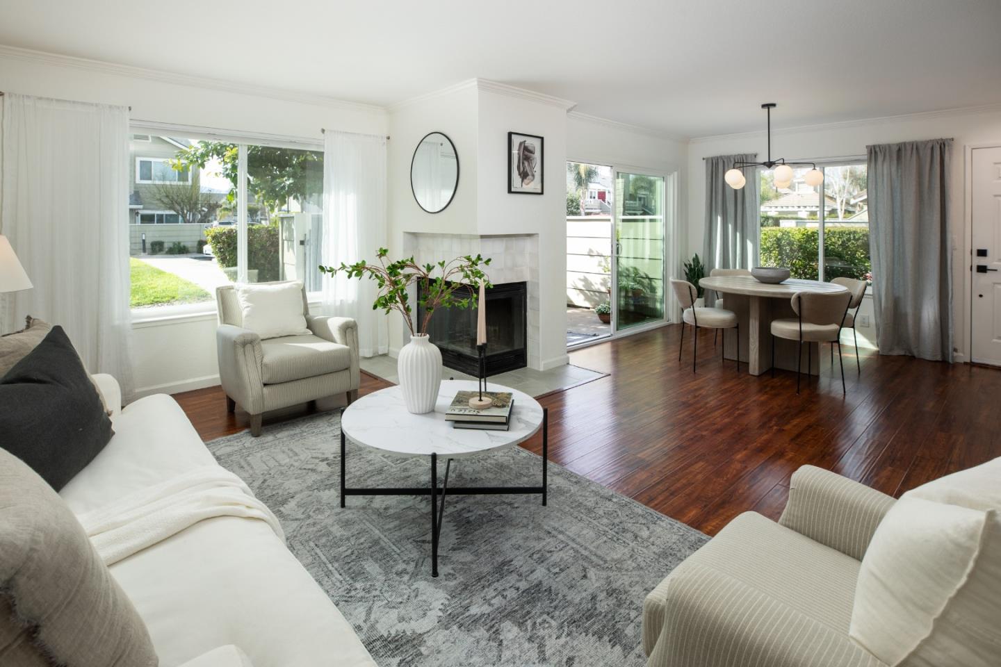 40 Cherryton Lane San Jose, CA 95136 - Photo 8 of 27 a living room with fireplace furniture and a large window