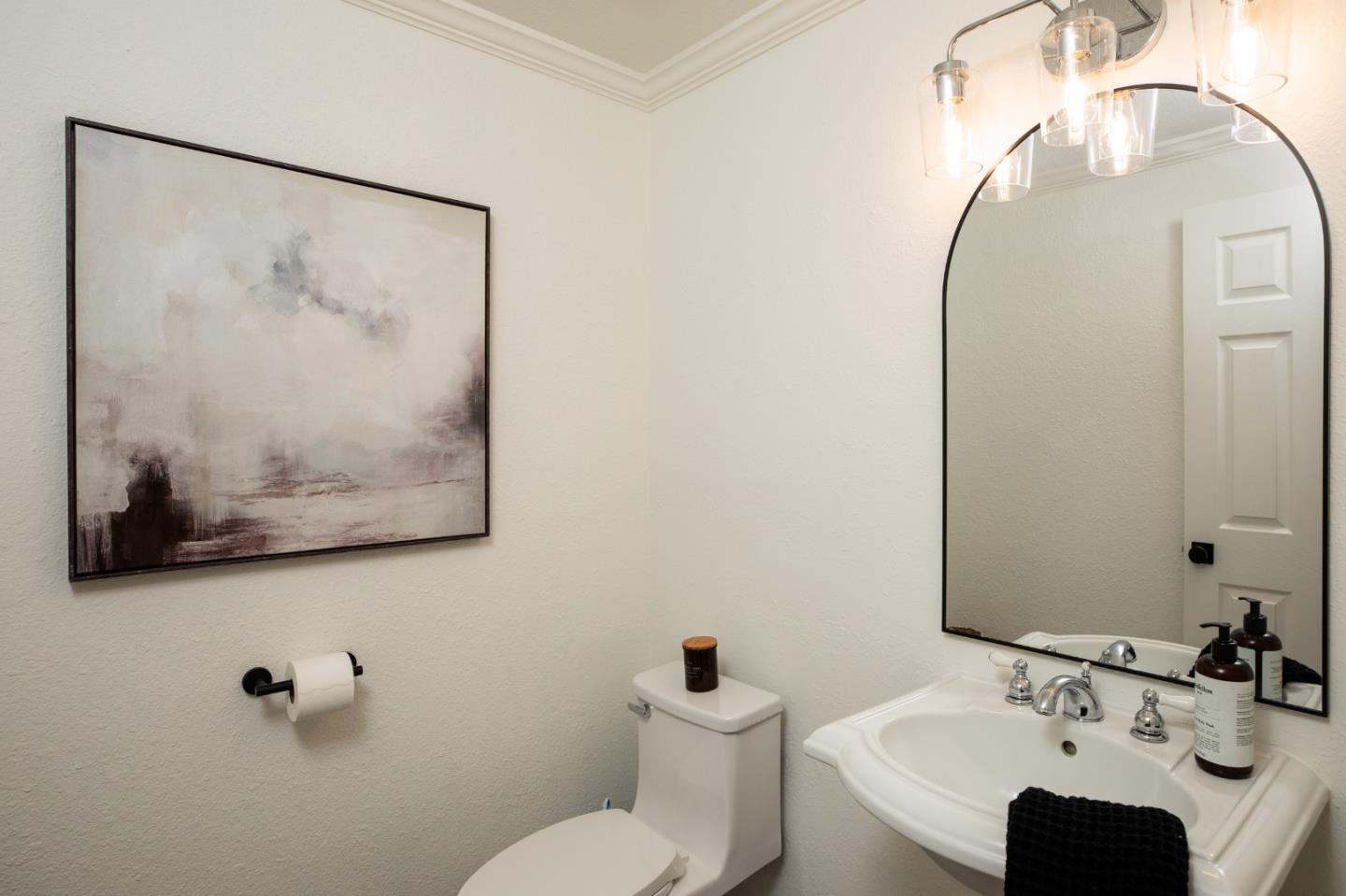 40 Cherryton Lane San Jose, CA 95136 - Photo 10 of 27 a bathroom with a toilet sink and mirror