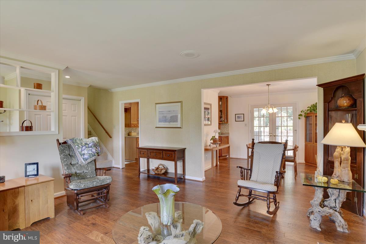 7516 Inzer Street Springfield, VA 22151 - Photo 8 of 30 a living room with furniture and wooden floor