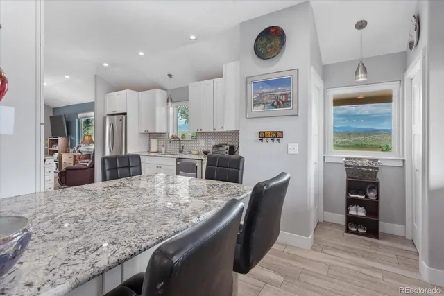 a view of kitchen and windows