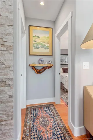 a view of a bedroom with bed and closet