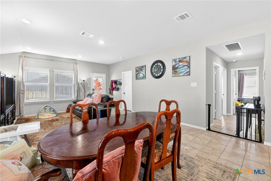 5102 Vivien Street Killeen, TX 76549 - Photo 7 of 23 a dining room with furniture and wooden floor