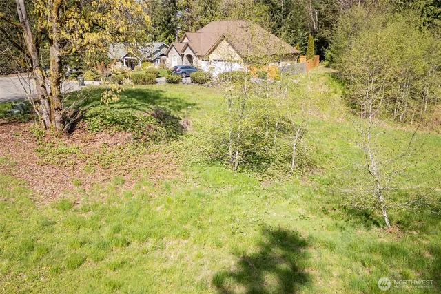 a view of swimming pool from a yard