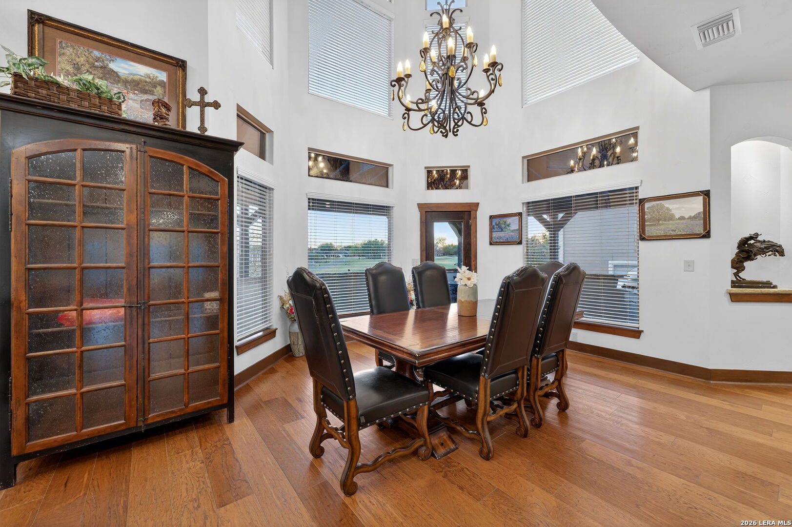 134 Bandit Beach Road New Braunfels, TX 78130 - Photo 20 of 77 a view of a dining room with furniture and wooden floor