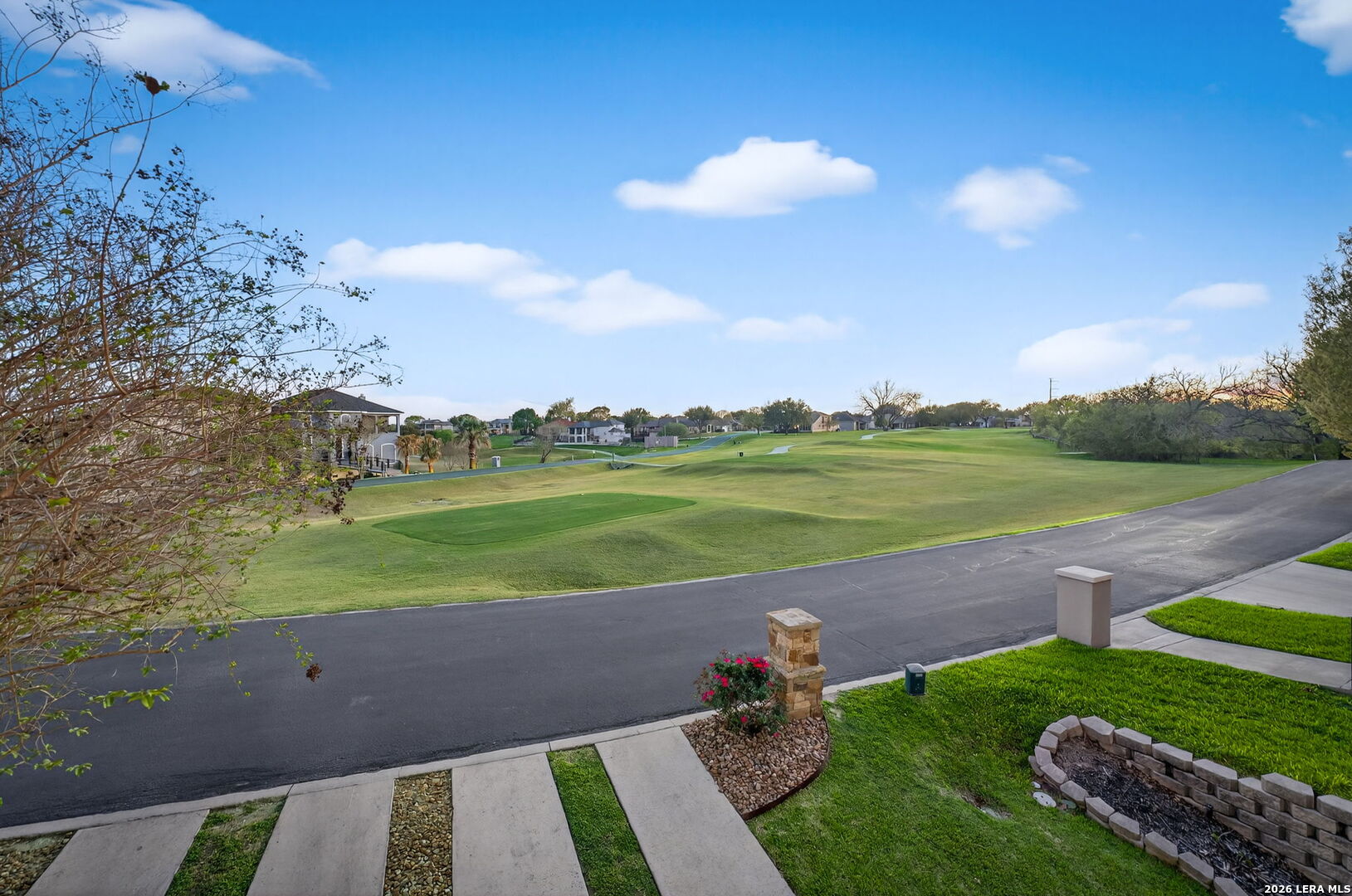 134 Bandit Beach Road New Braunfels, TX 78130 - Photo 2 of 77 a view of a golf course with a lake