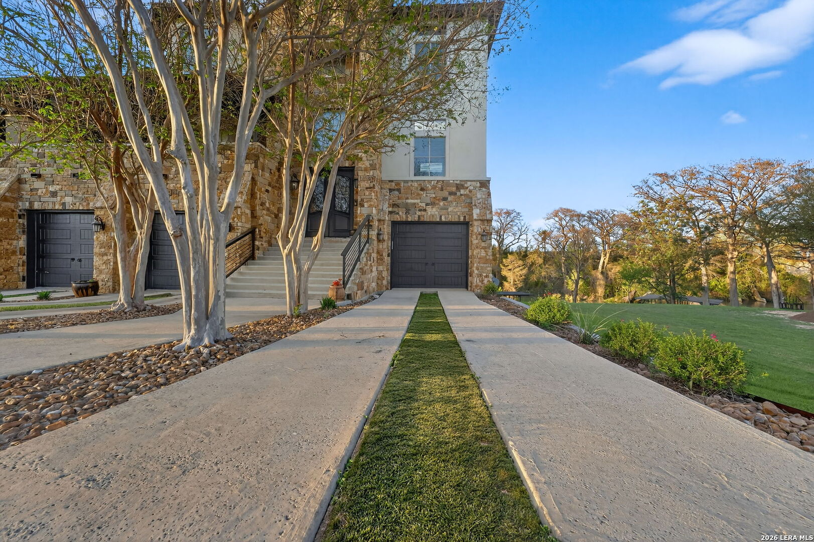 134 Bandit Beach Road New Braunfels, TX 78130 - Photo 3 of 77 a front view of a house with a yard