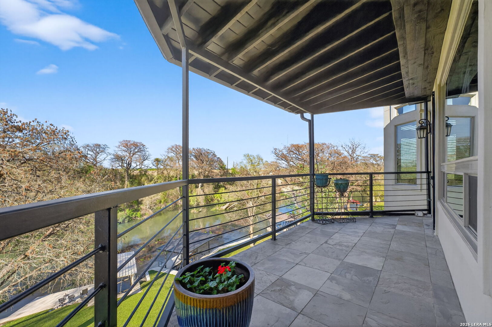 134 Bandit Beach Road New Braunfels, TX 78130 - Photo 37 of 77 a view of a porch with furniture and wooden floor