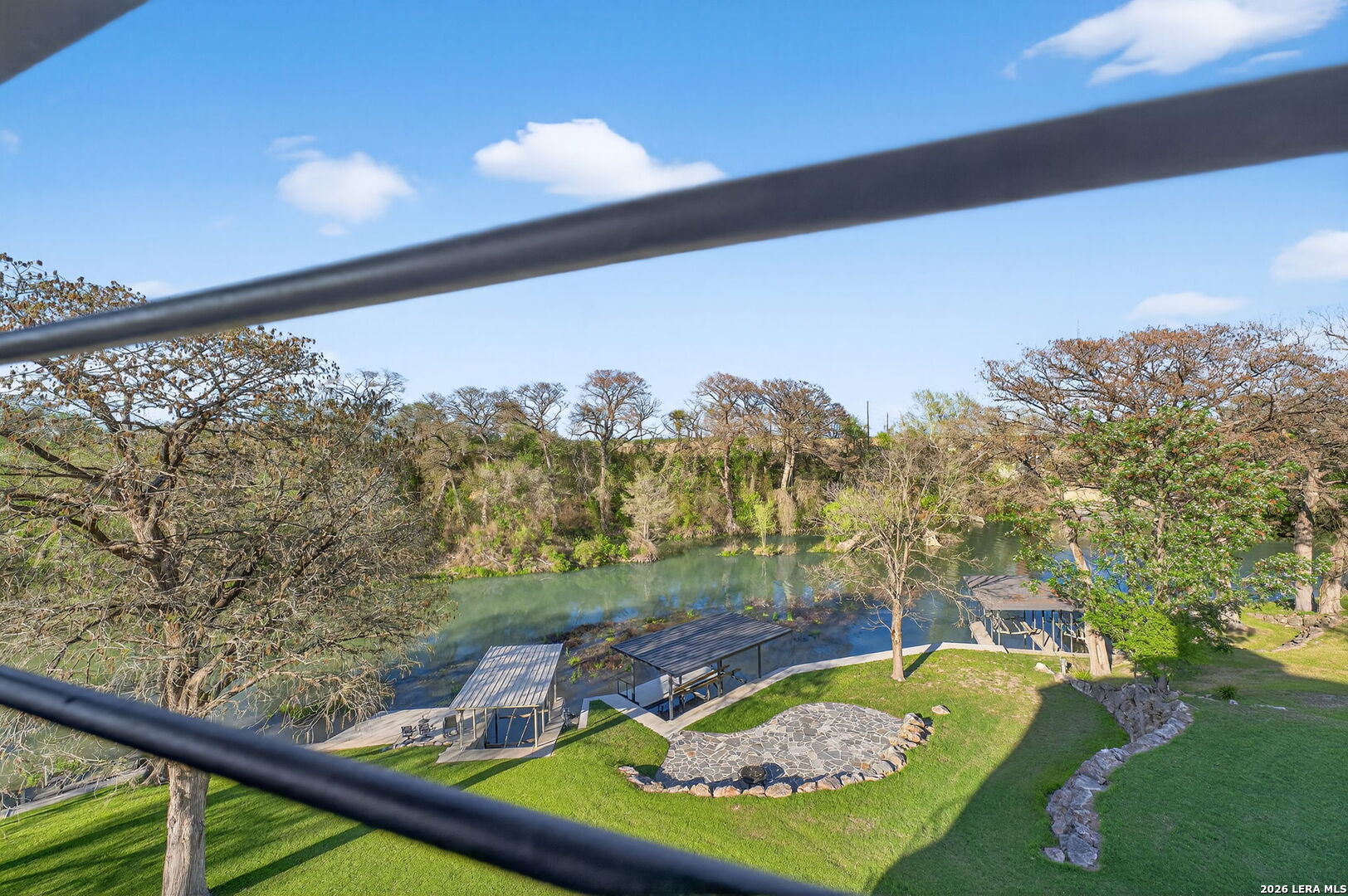 134 Bandit Beach Road New Braunfels, TX 78130 - Photo 38 of 77 a view of a swimming pool with a yard