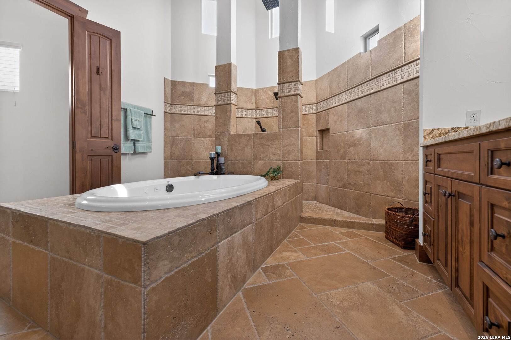 134 Bandit Beach Road New Braunfels, TX 78130 - Photo 46 of 77 a bathroom with a sink and mirror