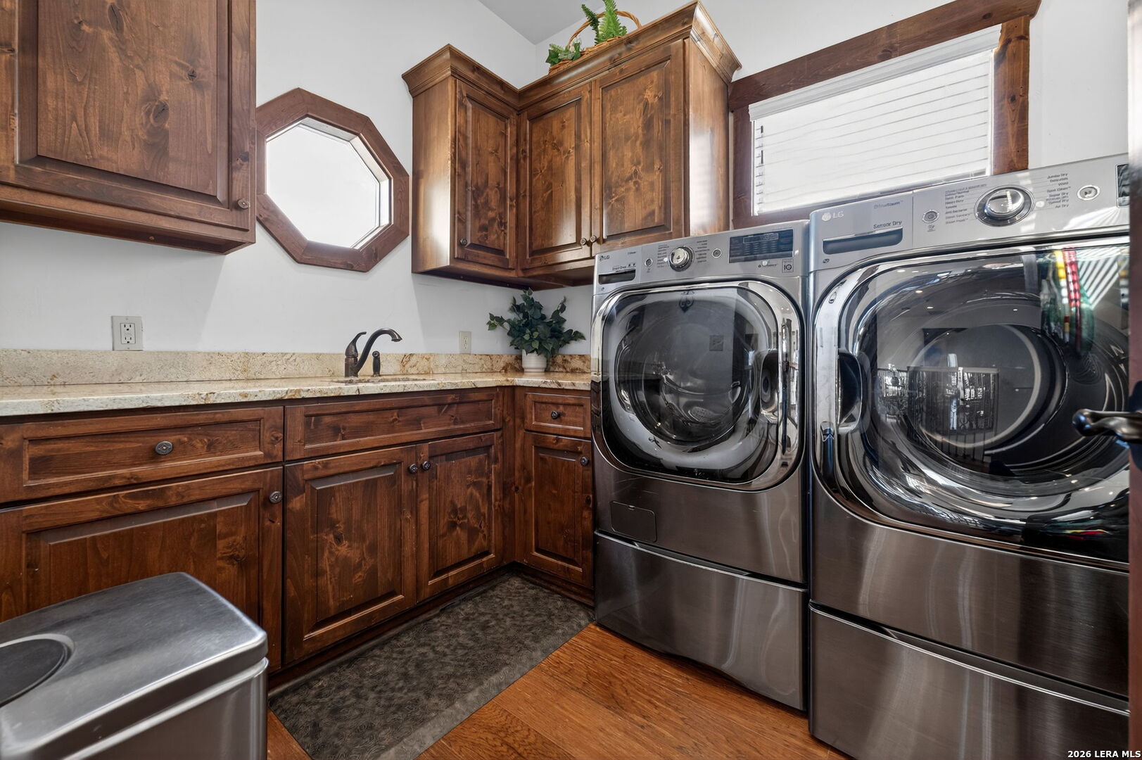 134 Bandit Beach Road New Braunfels, TX 78130 - Photo 52 of 77 a utility room with sink dryer and washer