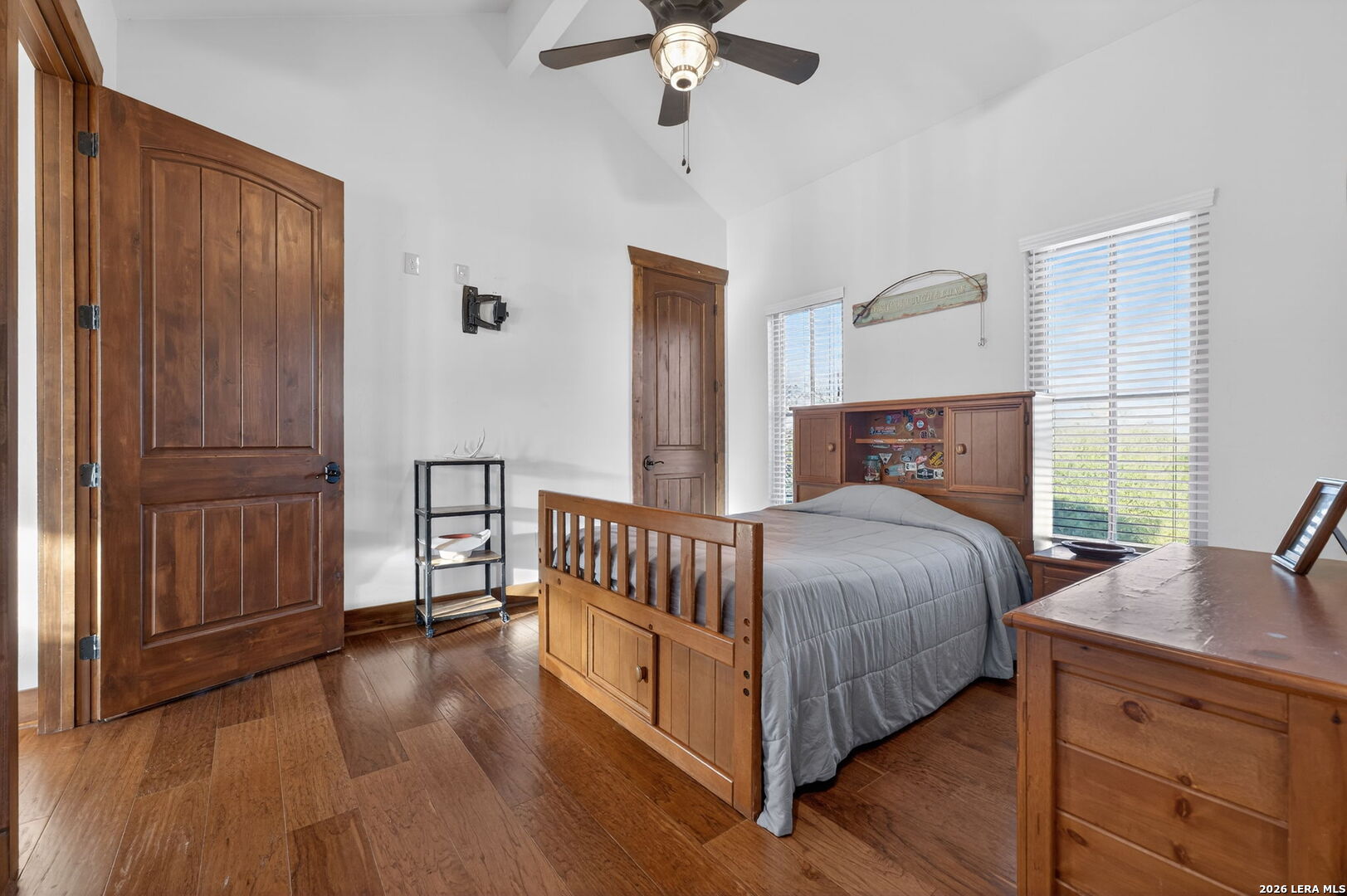 134 Bandit Beach Road New Braunfels, TX 78130 - Photo 56 of 77 a spacious bedroom with a bed and a dresser