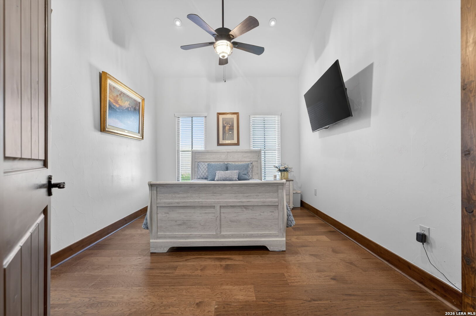 134 Bandit Beach Road New Braunfels, TX 78130 - Photo 58 of 77 a living room with furniture and a flat screen tv