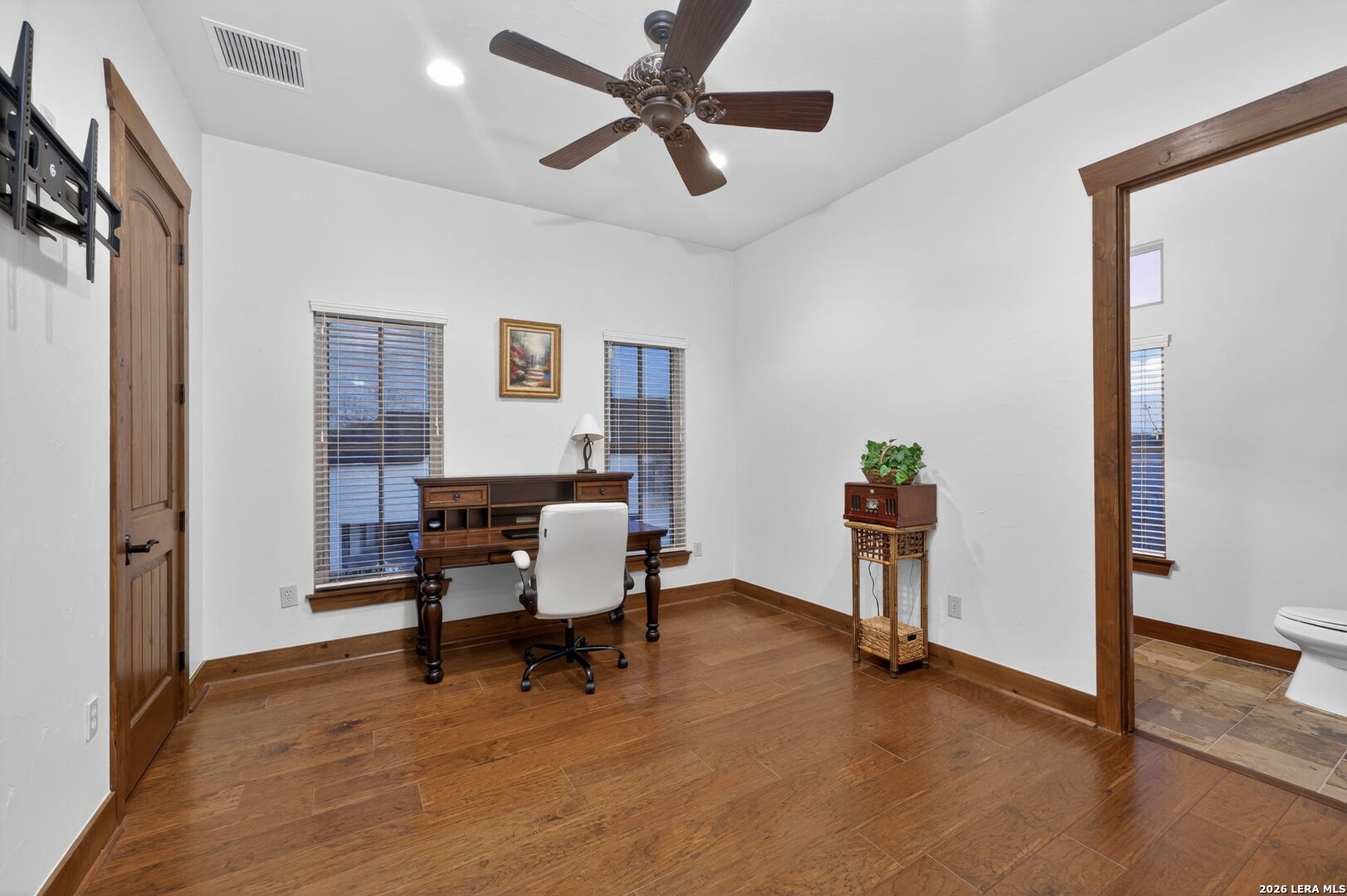 134 Bandit Beach Road New Braunfels, TX 78130 - Photo 60 of 77 a work room with furniture and a wooden floor