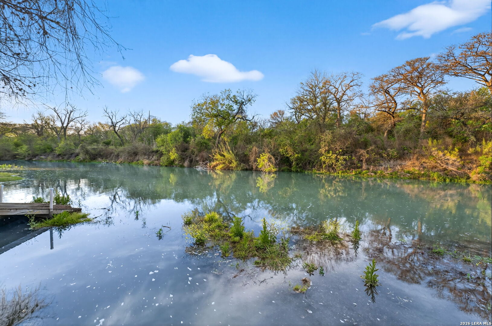 134 Bandit Beach Road New Braunfels, TX 78130 - Photo 70 of 77 a view of a lake in between two chairs