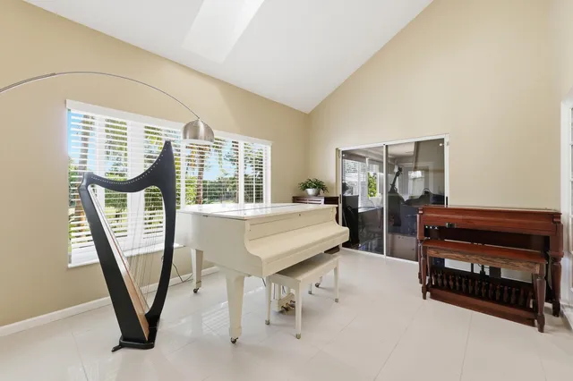 a bathroom with a sink a toilet and a shower