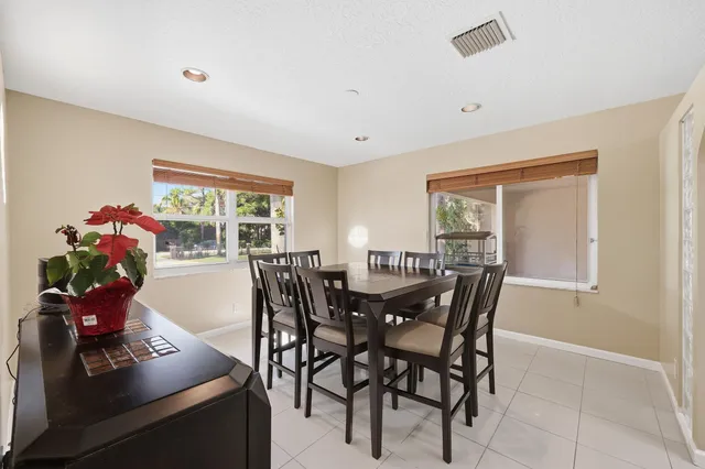 a view of balcony with a palm tree