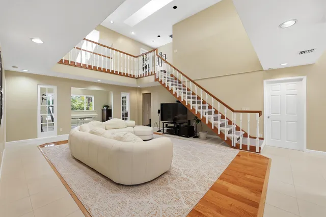 a view of a dining room with furniture window and outside view