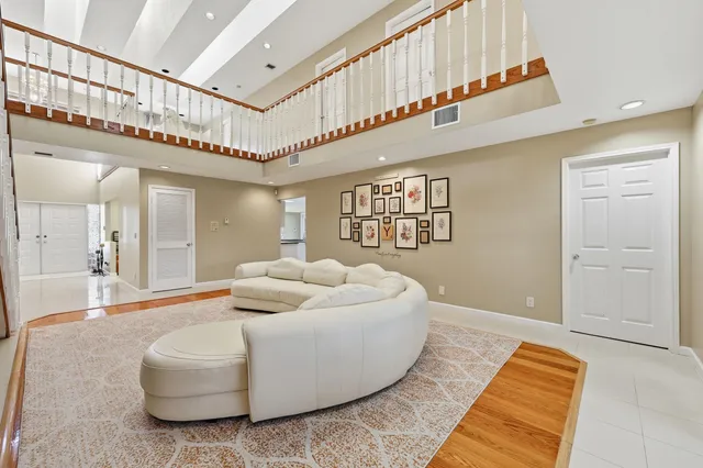 a view of a dining room with furniture and window