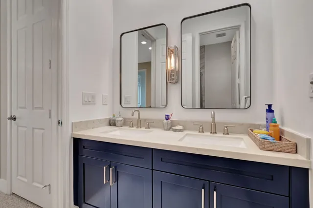 a bedroom with a bed and a chair