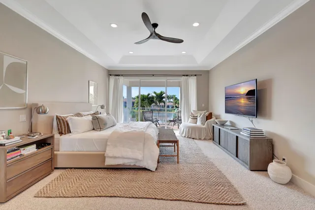 a large bathroom with a shower sink and mirror