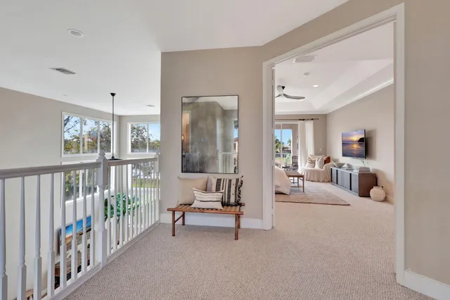 a view of a balcony with furniture