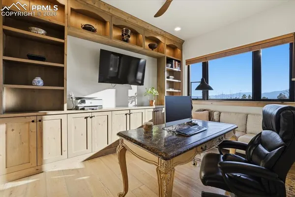 a kitchen with stainless steel appliances kitchen island granite countertop a sink and cabinets