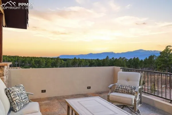 a view of a chairs in a balcony