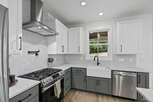 a view of a hallway with wooden floor and closet