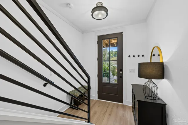 a view of entryway with wooden floor
