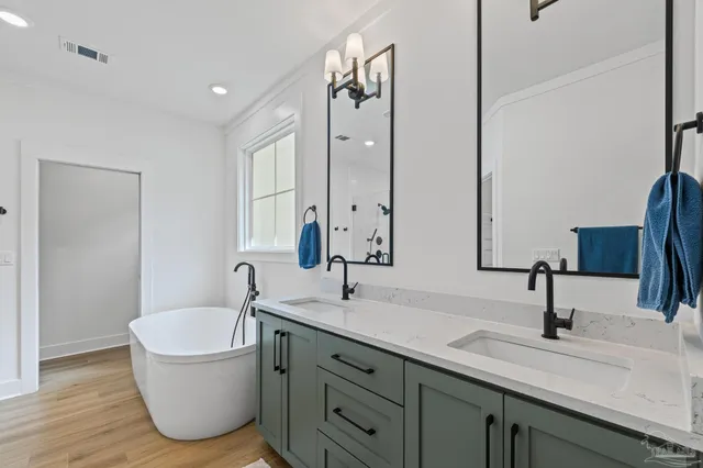 front view of a house with a potted plant