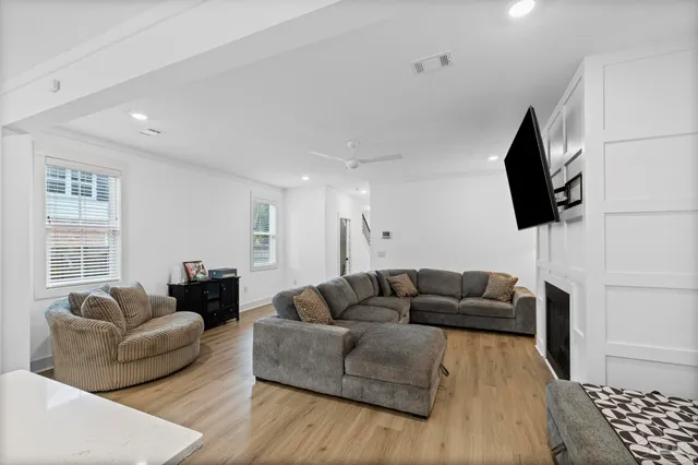 a open kitchen with stainless steel appliances a stove top oven and sink