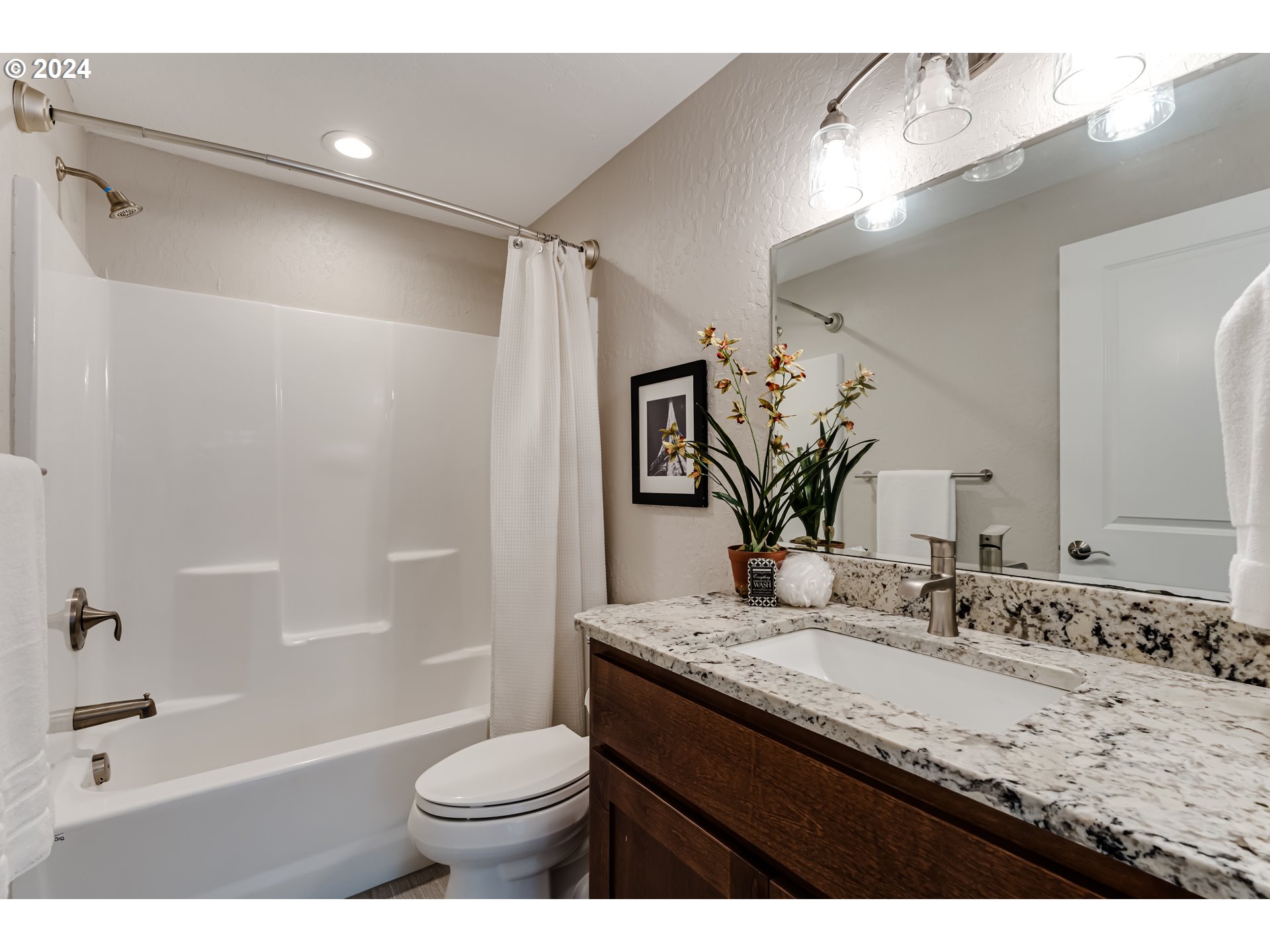 4288 Cole Way Springfield, OR 97478 - Photo 12 of 21 a bathroom with a granite countertop sink toilet and shower