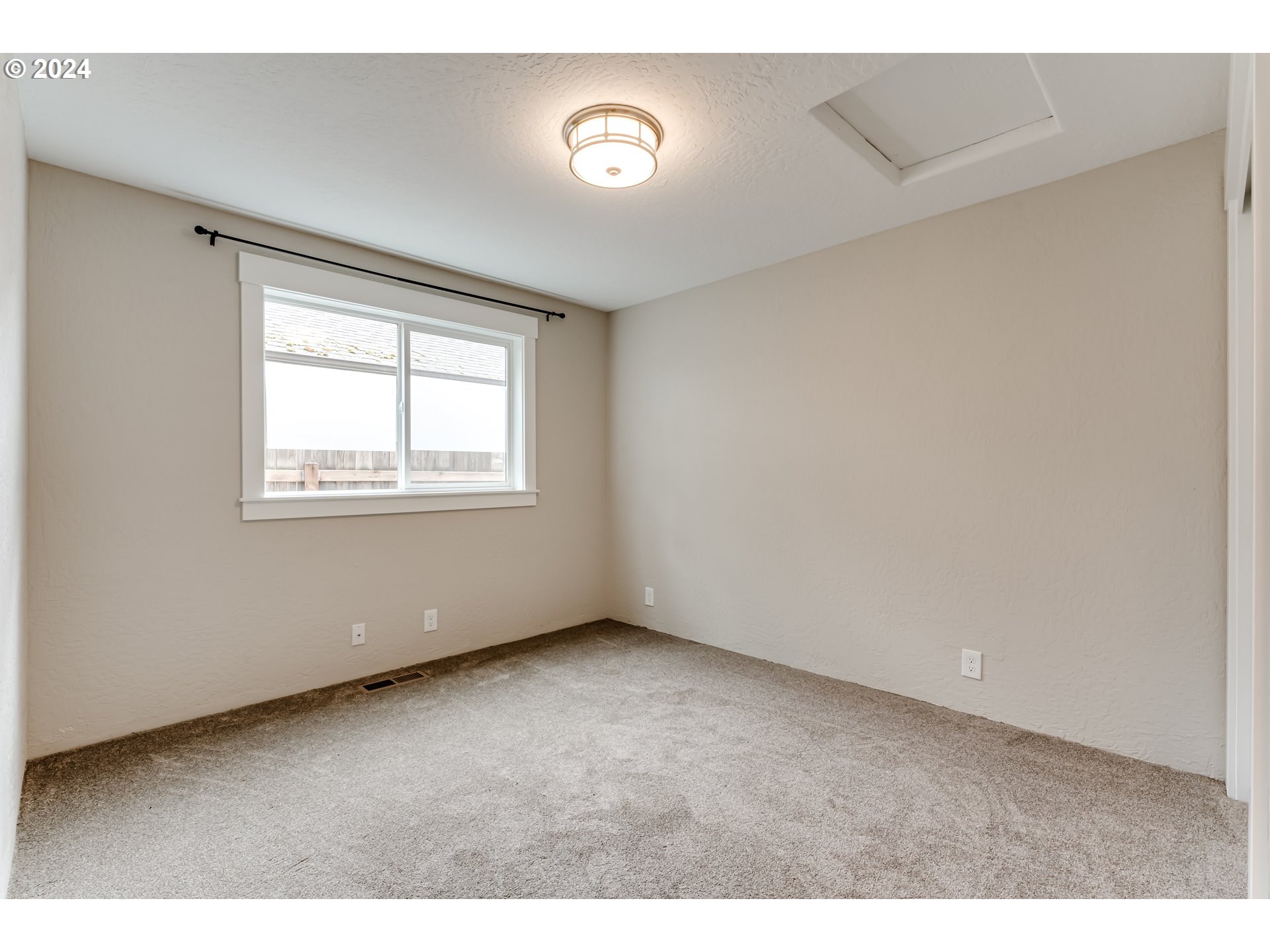 4288 Cole Way Springfield, OR 97478 - Photo 16 of 21 a view of an empty room with wooden floor