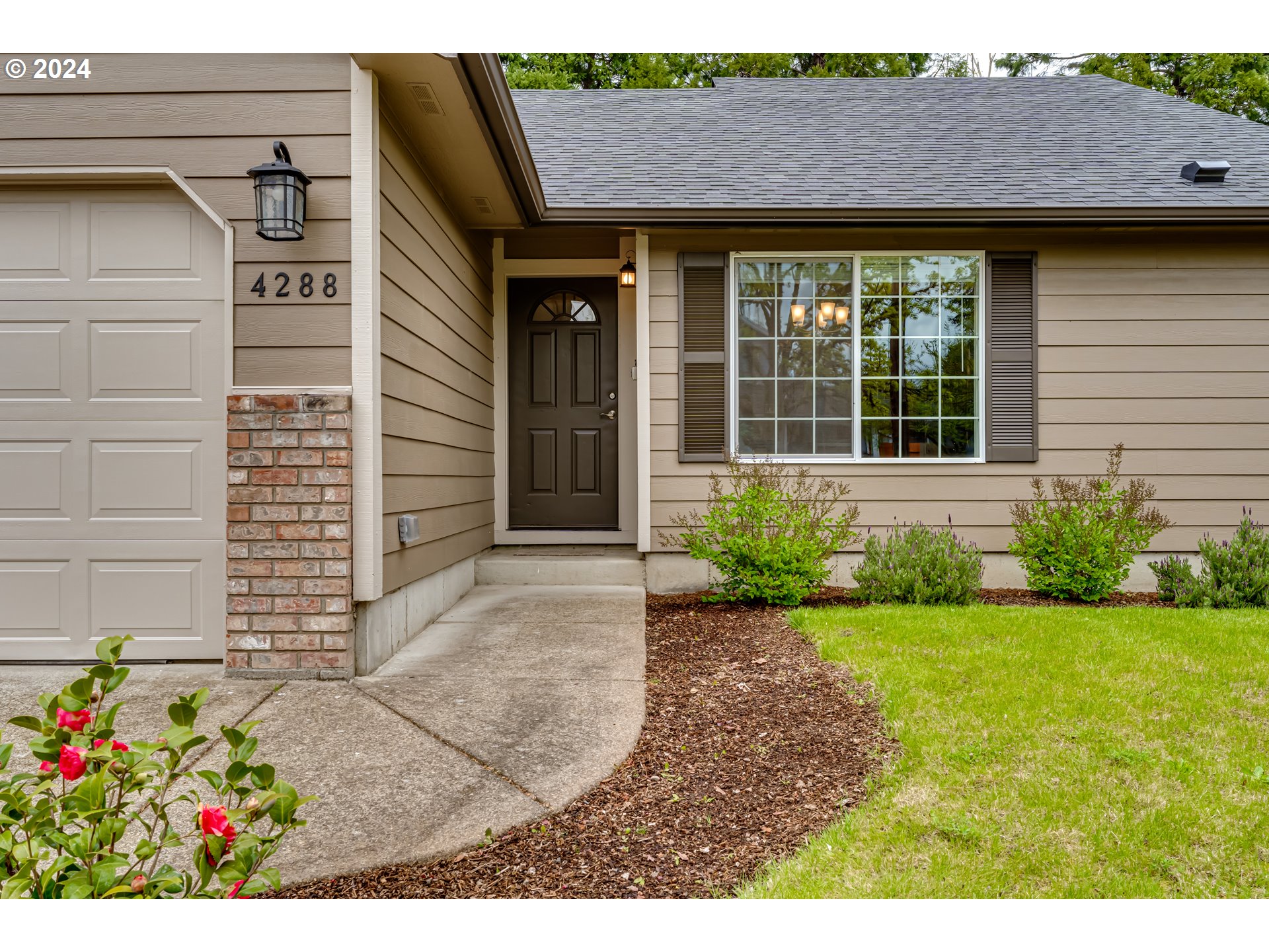 4288 Cole Way Springfield, OR 97478 - Photo 2 of 21 a view of a house with potted plants