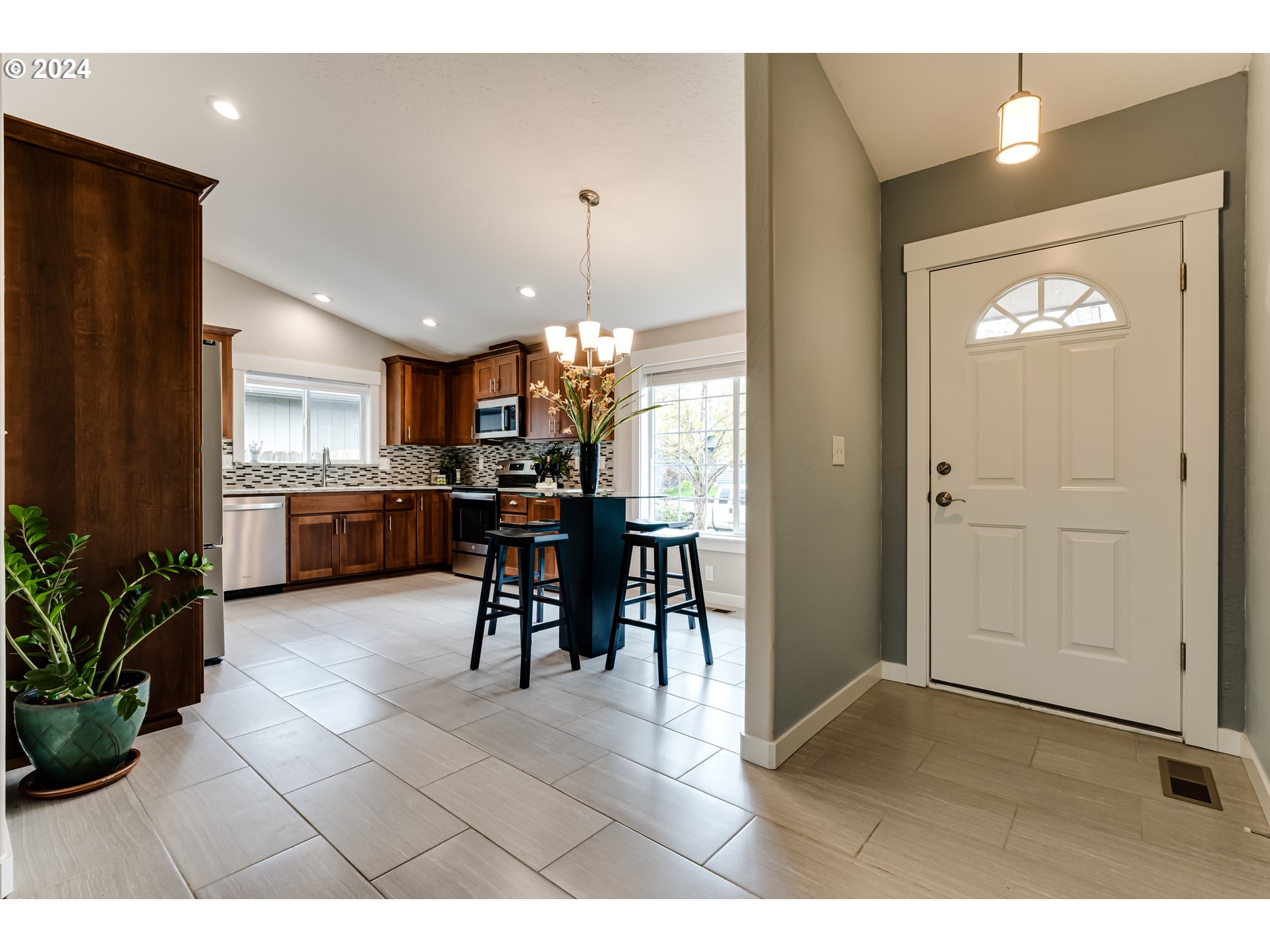 4288 Cole Way Springfield, OR 97478 - Photo 3 of 21 a view of a dining room with furniture window and wooden floor