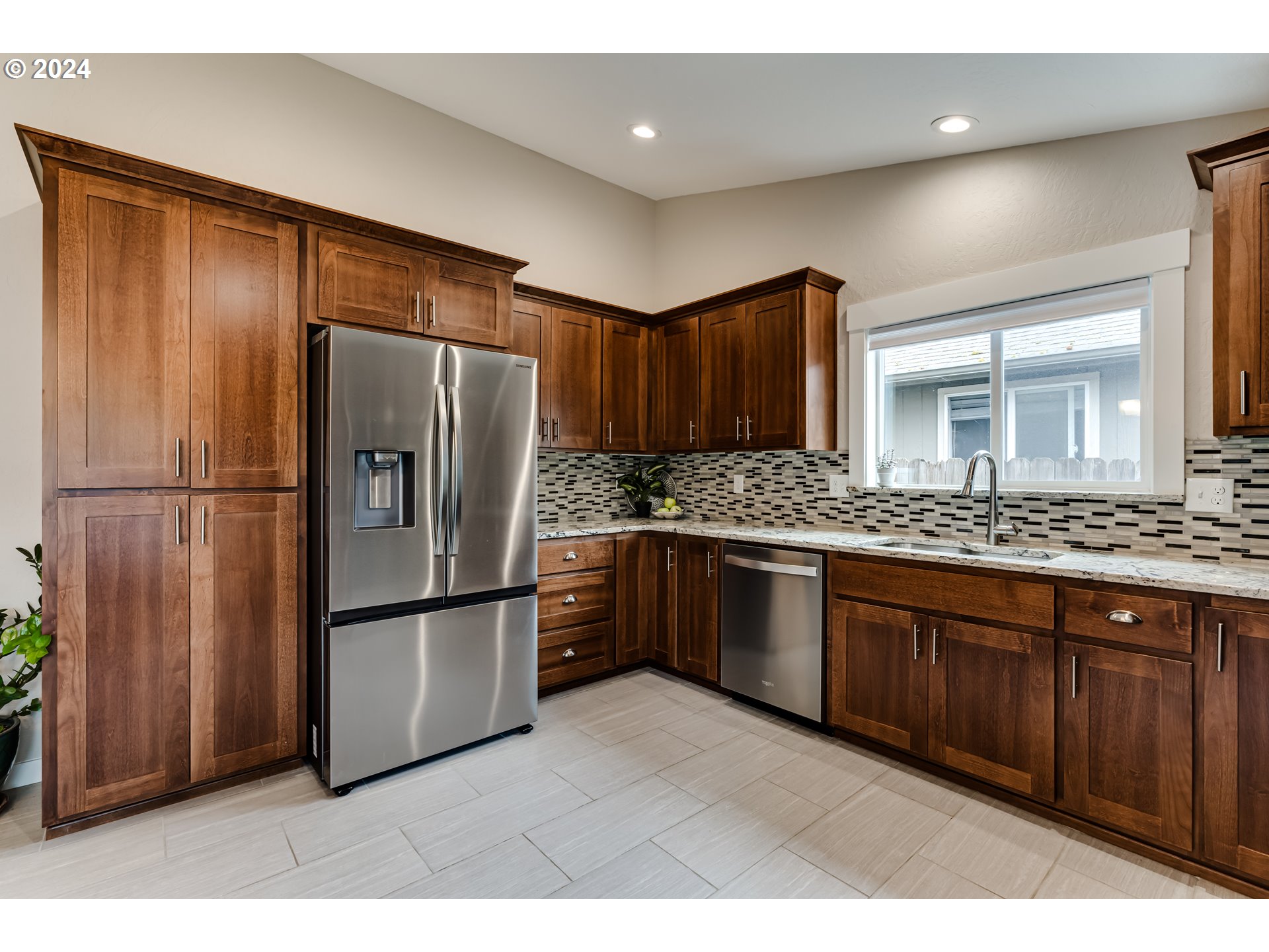 4288 Cole Way Springfield, OR 97478 - Photo 6 of 21 a kitchen with stainless steel appliances granite countertop a refrigerator and a sink