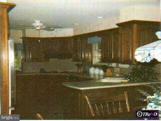 2419 Mill Road Atco, NJ 08004 - Photo 2 of 3 a bathroom with a mirror