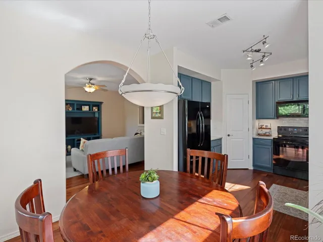 a view of a dining room with furniture