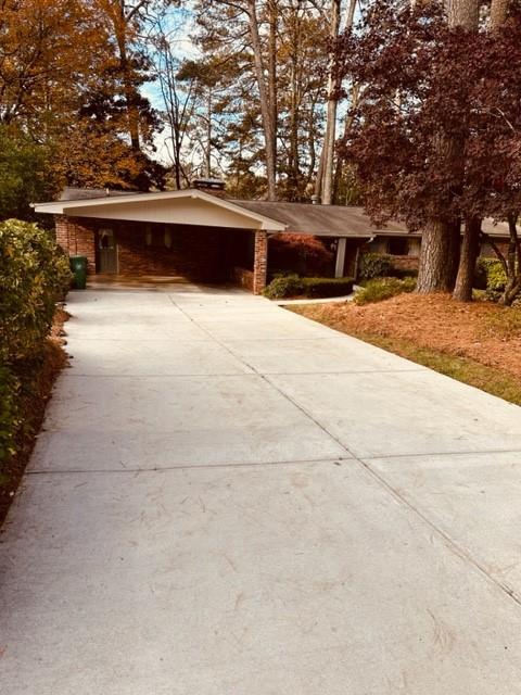 2553 Circlewood Road Northeast Atlanta, GA 30345 - Photo 1 of 1 View of front of house featuring a carport