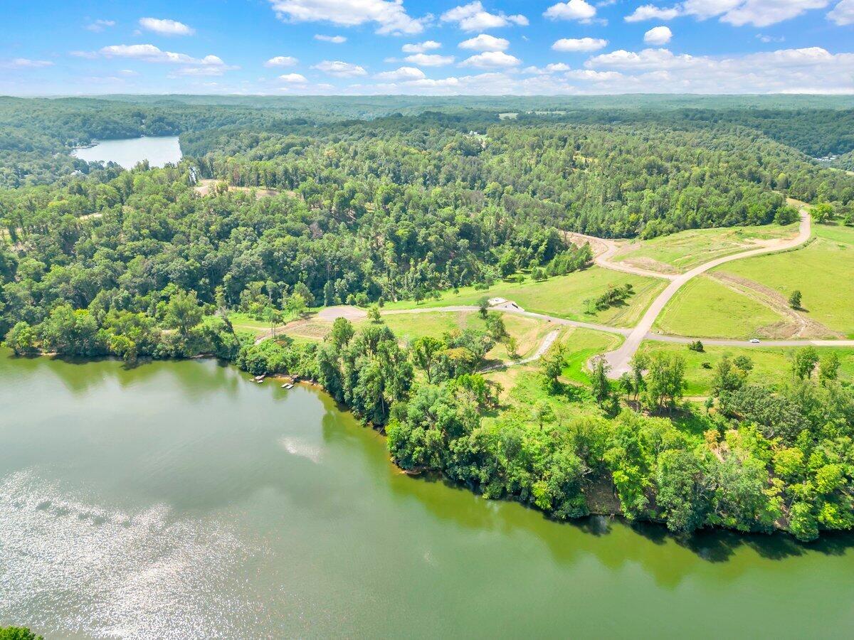 Lot 19 Springsteen Circle Goodview, VA 24095 - Photo 11 of 12 a view of a lake with a yard