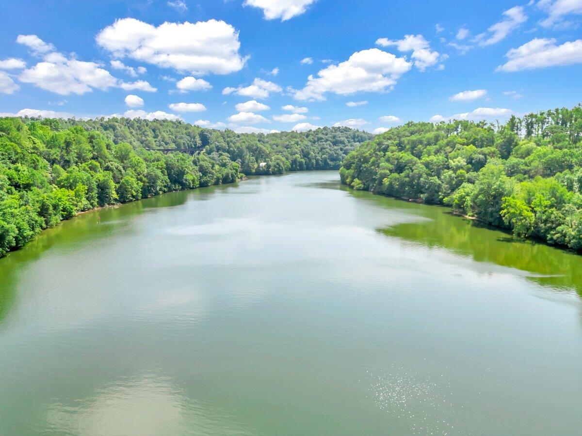 Lot 19 Springsteen Circle Goodview, VA 24095 - Photo 3 of 12 a view of a lake with a house in the background