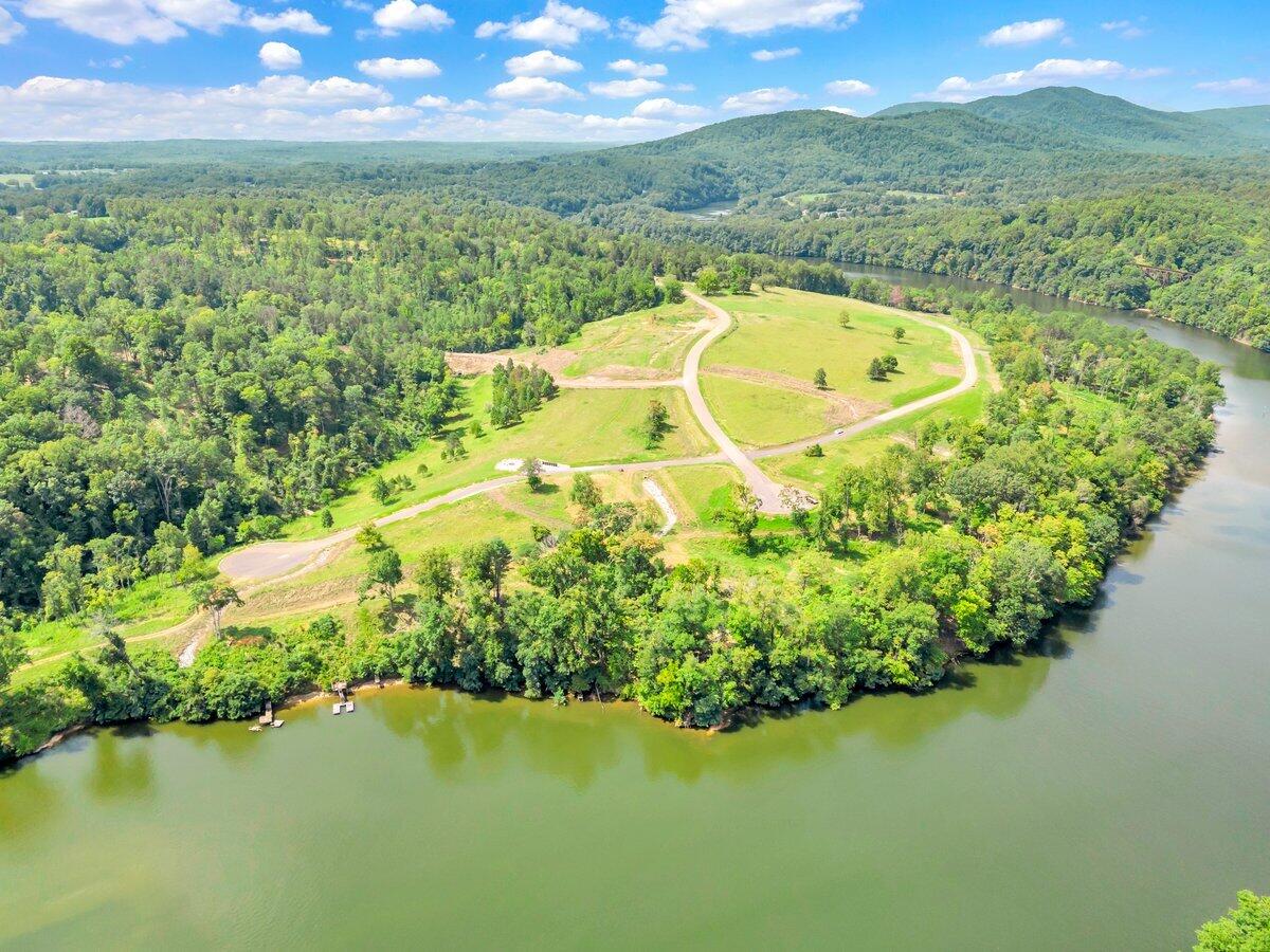 Lot 19 Springsteen Circle Goodview, VA 24095 - Photo 9 of 12 a view of a lake with a mountain