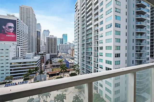 a view of a balcony with city view